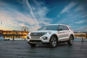White 2020 Ford Explorer in Front of Ferris Wheel